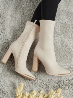 Botki damskie eko skórzane na słupku Morvella