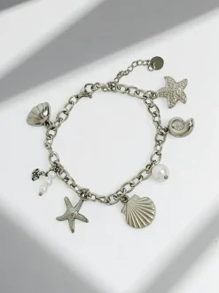 Bransoletka Asteria Mare ze srebrnymi zawieszkami inspirowana morzem