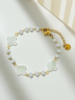Bransoletka Aurelia Bianca z kwiatami w odcieniu białej perły, złocona