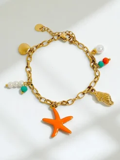 Bransoletka Callista Mare – złoty łańcuszek z muszlami i gwiazdą morską