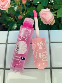 Błyszczyk do ust z brokatem zmianiający kolor Rose