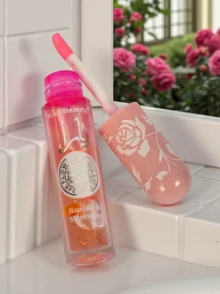 Błyszczyk do ust z brokatem zmianiający kolor Light Pink