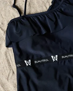 Czarny jednoczęściowy kostium kąpielowy damski z falbanką - Bielizna