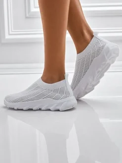 Damskie białe tenisówki Astrea z przewiewnej tkaniny na płaskiej podeszwie