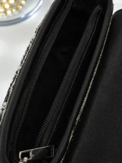 Kopertowa torebka damska z cyrkoniami Zyora