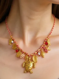 Naszyjnik Atena Charm Sea – złote amulety z motywami morskimi