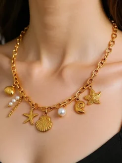 Naszyjnik Atena Charm Sea – złote amulety z motywami morskimi