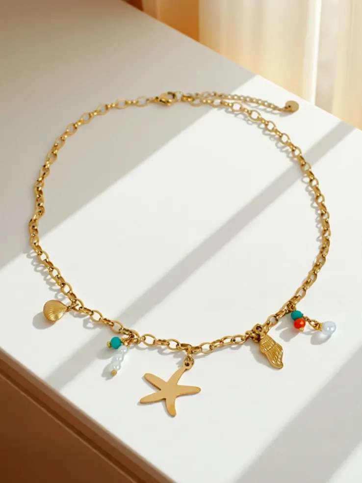 Naszyjnik Atena Charm Sea – złote amulety z motywami morskimi