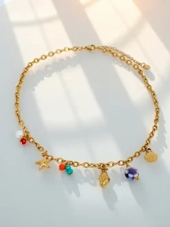 Naszyjnik Atena Charm Sea – złote amulety z motywami morskimi