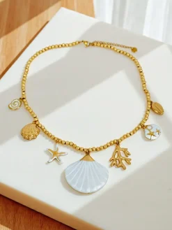 Naszyjnik Atena Charm Sea – złote amulety z motywami morskimi