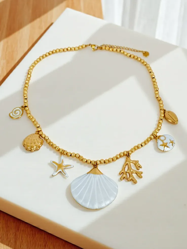 Naszyjnik Atena Charm Sea – złote amulety z motywami morskimi