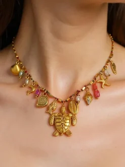 Naszyjnik Atena Charm Sea – złote amulety z motywami morskimi
