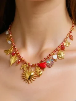 Naszyjnik pozłacany Calista Charmella z zawieszkami z żywicy