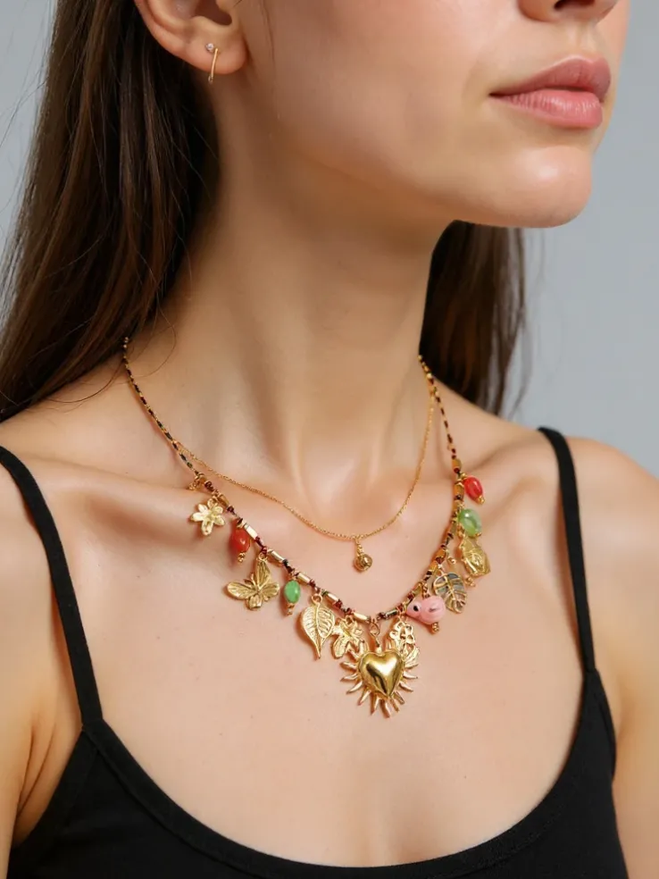 Naszyjnik pozłacany Calista Charmella z zawieszkami z żywicy