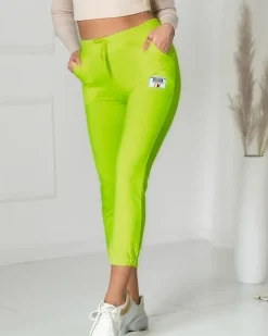 Neonowe żółte damskie spodnie dresowe z naszywką- Odzież