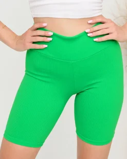 Neonowe zielone damskie prążkowane legginsy kolarki - Odzież