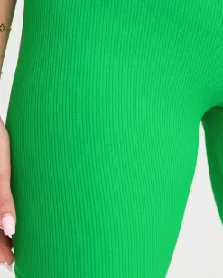 Neonowe zielone damskie prążkowane legginsy kolarki - Odzież