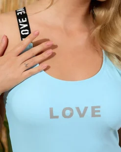 Niebieski jednoczęściowy strój kąpielowy z napisami - Bielizna