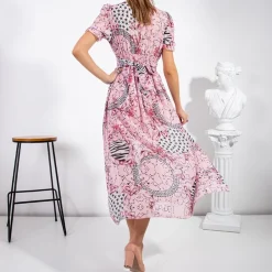 Różowa damska maxi sukienka - Odzież