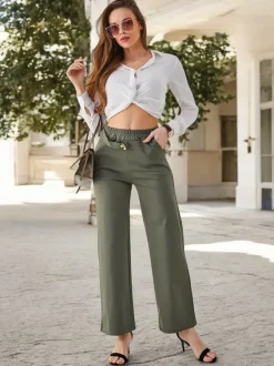 Royalfashion Bawełniane szerokie spodnie damskie ze zdobieniem a'la pasek