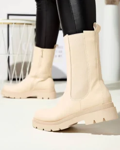 Royalfashion Beżowe damskie wysokie botki na płaskim obcasie Vedesa