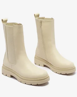 Royalfashion Beżowe damskie wysokie botki na płaskim obcasie Vedesa