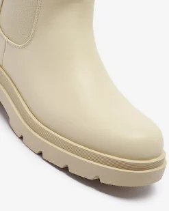 Royalfashion Beżowe damskie wysokie botki na płaskim obcasie Vedesa