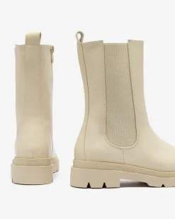 Royalfashion Beżowe damskie wysokie botki na płaskim obcasie Vedesa