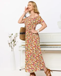 Royalfashion Biała sukienka damska midi we wzór w kwiaty