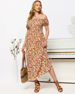 Royalfashion Biała sukienka damska midi we wzór w kwiaty