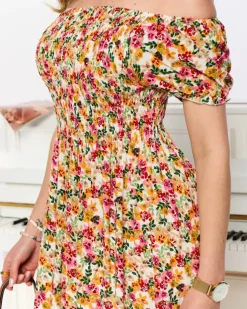 Royalfashion Biała sukienka damska midi we wzór w kwiaty