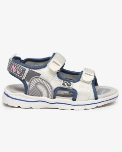 Royalfashion Białe dziecięce sandałki z naszywkami Kiteks