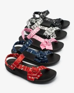 Royalfashion Białe sandały damskie z kokardką Oyall