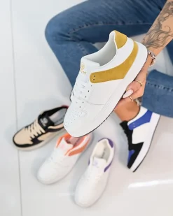 Royalfashion Biało- musztardowe damskie buty sportowe Elevace