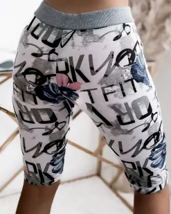 Royalfashion Biało- niebieskie spodenki damskie 3/4 z printem