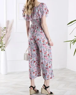 Royalfashion Biało- różowy długi kombinezon damski w kwiaty