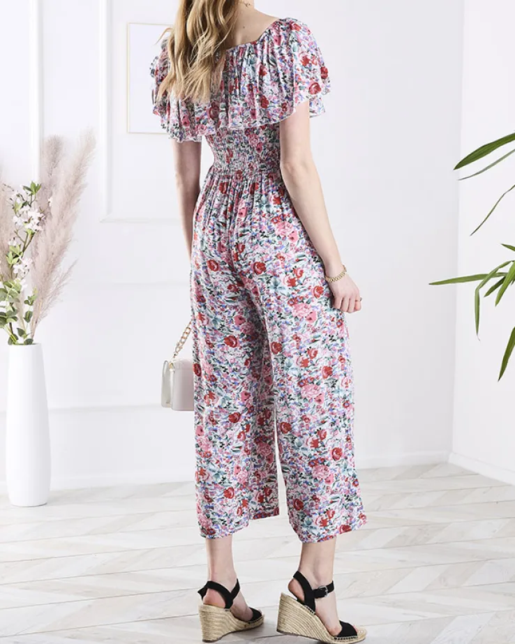 Royalfashion Biało- różowy długi kombinezon damski w kwiaty