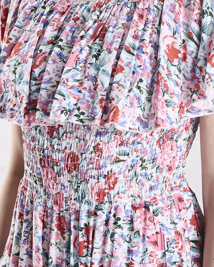 Royalfashion Biało- różowy długi kombinezon damski w kwiaty