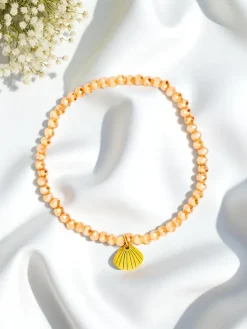 Royalfashion Bransoletka damska z zawieszką muszelki