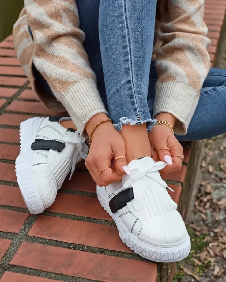 Royalfashion Czarno-białe damskie buty sportowe z gumowymi wstawkami Inika