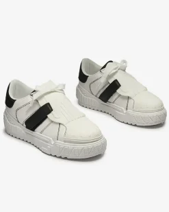 Royalfashion Czarno-białe damskie buty sportowe z gumowymi wstawkami Inika