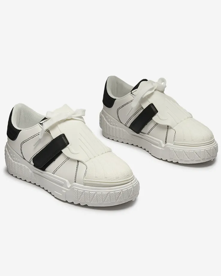 Royalfashion Czarno-białe damskie buty sportowe z gumowymi wstawkami Inika