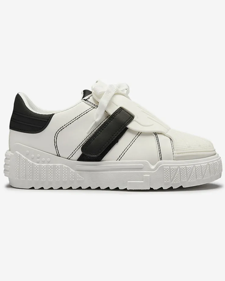 Royalfashion Czarno-białe damskie buty sportowe z gumowymi wstawkami Inika