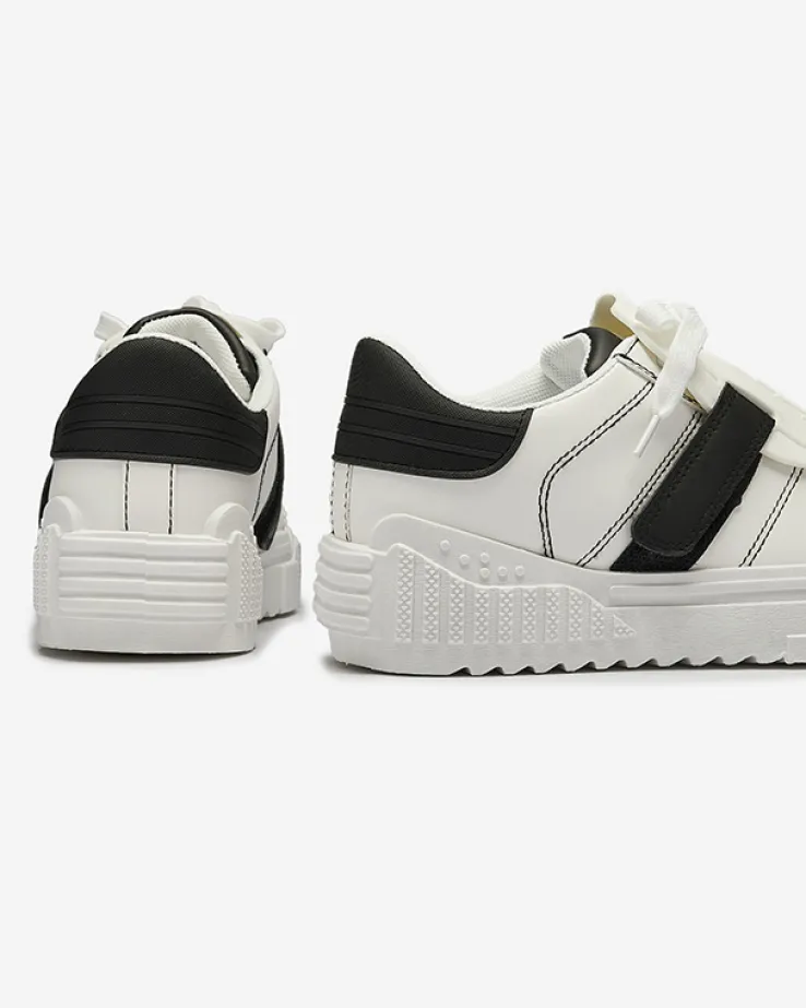 Royalfashion Czarno-białe damskie buty sportowe z gumowymi wstawkami Inika