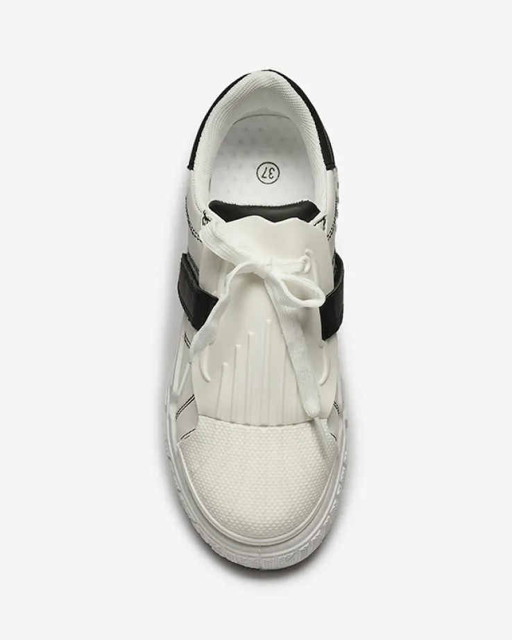 Royalfashion Czarno-białe damskie buty sportowe z gumowymi wstawkami Inika