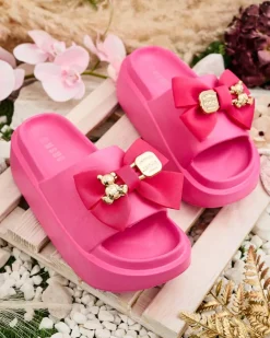 Royalfashion Damskie gumowe klapki z ozdobną kokardką Apis