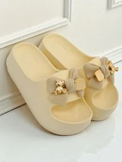 Royalfashion Damskie gumowe klapki z ozdobną kokardką Alday