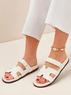 Royalfashion Damskie klapki na płaskiej podeszwie Arian