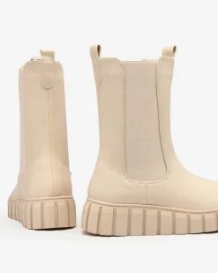 Royalfashion Damskie wysokie botki na płaskim obcasie w kolorze ecru Elicane