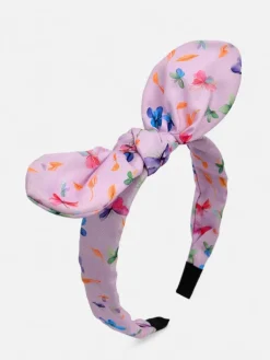Royalfashion Dziecięca opaska do włosów z kokardką z printem